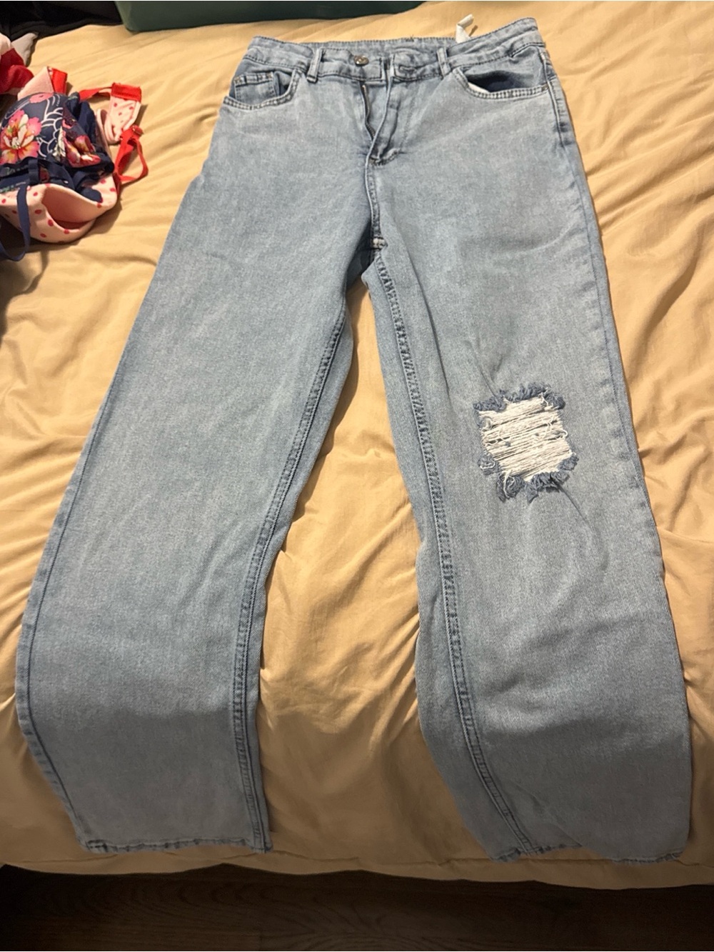 Light Wash High-Rise Wide Leg Jeans with Distressed Knee